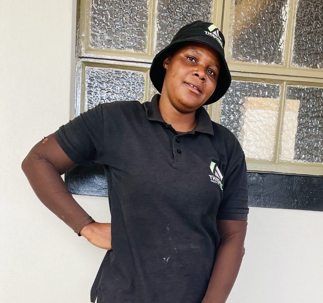 woman in The Mel Group uniform