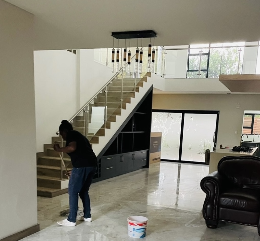 woman mopping floor